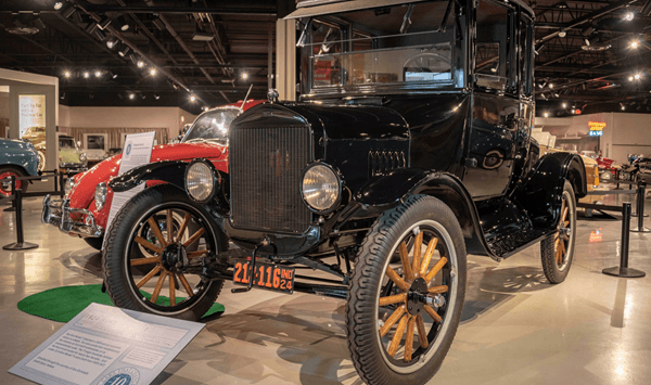 Which vehicle is historically recognized as America's first car to be produced on a large scale?