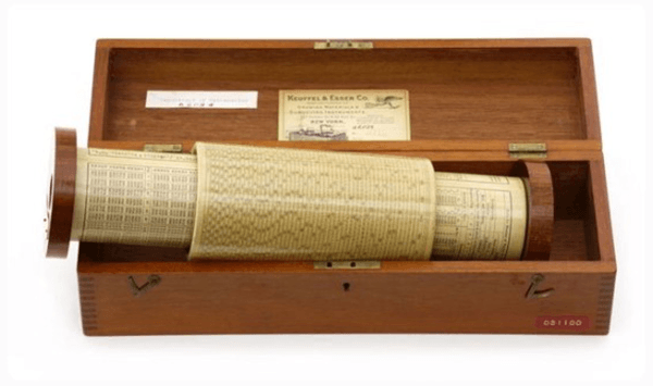 Which vintage mechanical calculating instrument is presented in this wooden box?