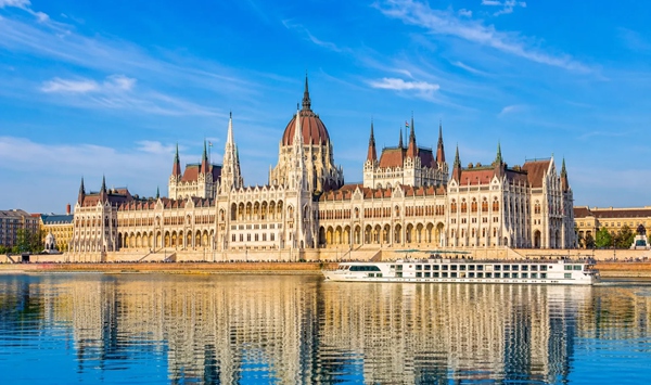 Flowing through 10 European countries and four national capitals, which river is the second-longest in Europe and a favorite route for luxury river cruises?