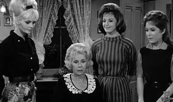 Kate Bradley and her three charming daughters managed the cozy Shady Rest Hotel in the rural town of Hooterville in which popular sitcom?