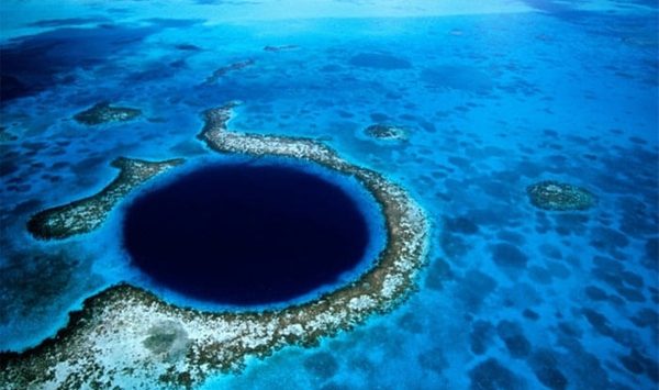 Reaching a staggering depth of nearly 36,000 feet (11,000 meters) in the western Pacific Ocean, what is the deepest known point on Earth?