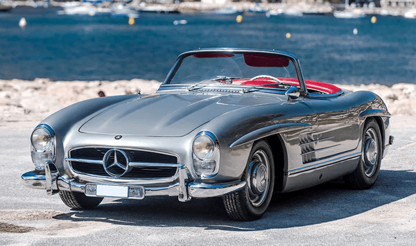 What is the name of the car that first introduced the famous gull-wing door design to the world?