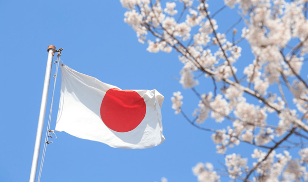 Which country's flag consists of a simple red circle on a white background, representing the rising sun?