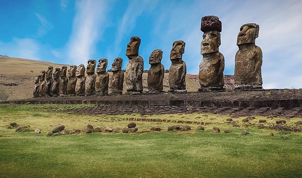 Known locally as Moai, these famous stone statues belong to which isolated Chilean territory in the southeastern Pacific Ocean?
