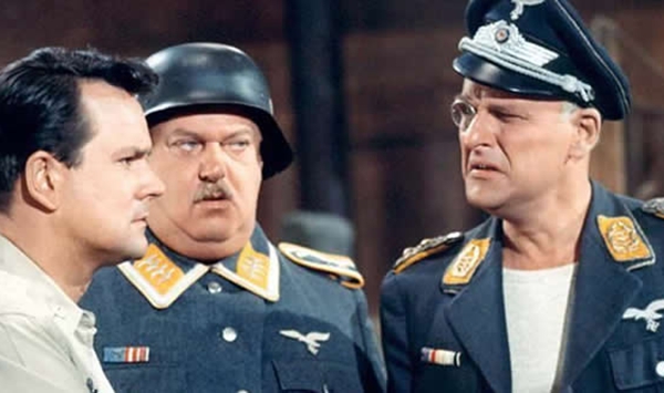 Which WWII-set sitcom followed a group of resourceful Allied prisoners secretly running covert operations right under their captors' noses?