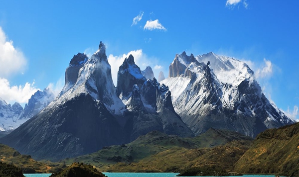 Stretching over 4,300 miles along the western coast of South America, which is the longest continental mountain range in the world?