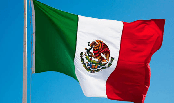 Which country's flag features vertical stripes of green, white, and red, with an eagle holding a snake on a cactus?