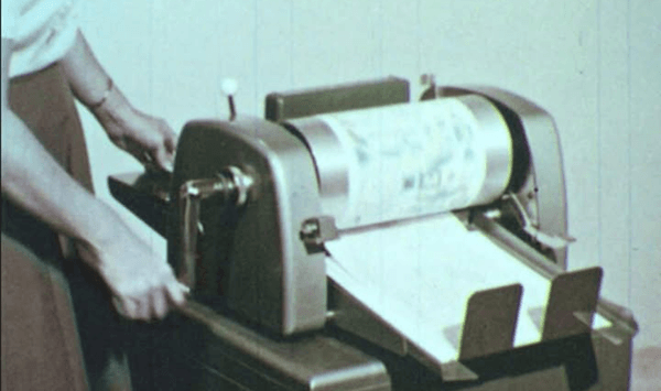 Remember when the teacher passed out fresh, purple-inked tests and the whole class took a big sniff? What was that iconic machine called?
