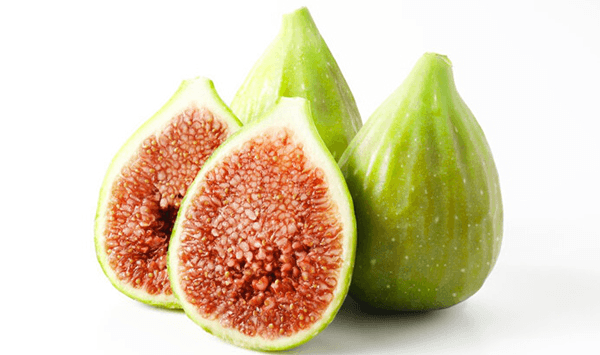 Which ancient Mediterranean fruit has a teardrop shape, soft sweet flesh, and is uniquely pollinated internally by tiny wasps?