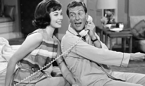 Which award-winning 1960s sitcom followed the hilarious balance between a TV writer's work life in Manhattan and his home life in New Rochelle?