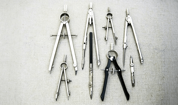 Which classic technical drawing tools are shown in this image?