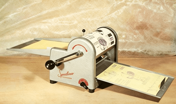 Which historic printing and duplicating apparatus is featured in this image?