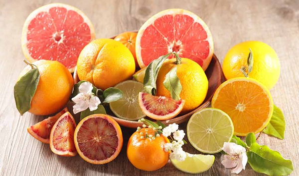 What natural citrus fruit was famously sliced in half, dipped in coarse salt, and used as an all-natural scrubber for wooden cutting boards?