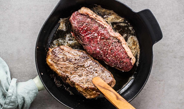 MYTH OR FACT: Searing meat at a high temperature seals in the natural juices and keeps the steak tender.
