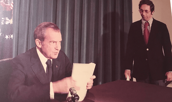 Which political scandal ultimately led to the resignation of President Richard Nixon in August 1974?