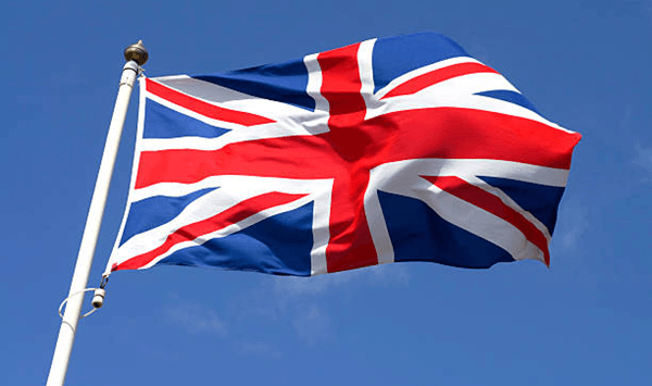 Which country's flag, known as the Union Jack, combines the crosses of St George, St Andrew, and St Patrick?