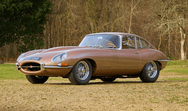 Which classic British sports car is often described as one of the most beautiful automobiles ever designed?