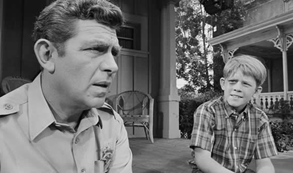 If you heard a cheerful, catchy whistle over a black-and-white opening scene, which classic 1960s small-town show were you about to watch?