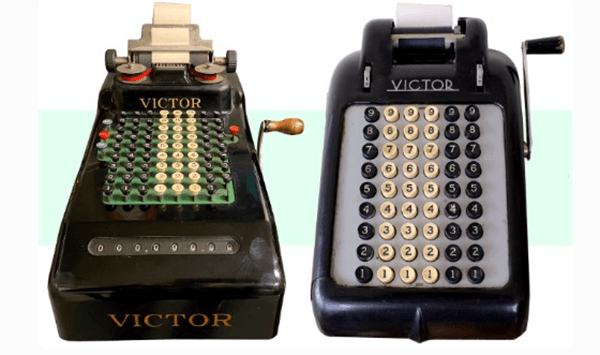 Which vintage mechanical business device is shown in this image?