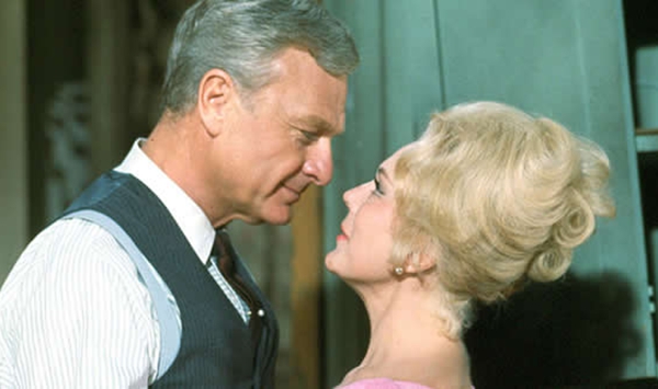 A high-powered Manhattan lawyer dragged his glamorous, city-loving wife to live on a broken-down farm in which classic CBS comedy?