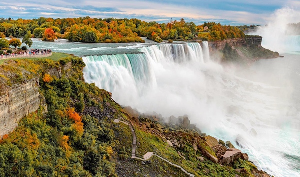 Straddling the border between the United States and Canada, this spectacular trio of waterfalls has been a favorite honeymoon destination since the 19th century. What is it called?