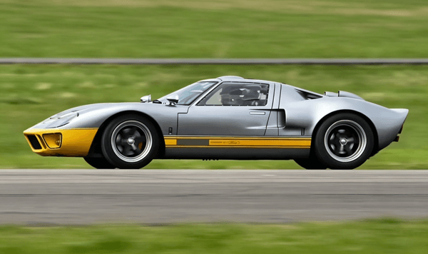 Which American race car dominated the 24 Hours of Le Mans by winning four consecutive times in the late 1960s?